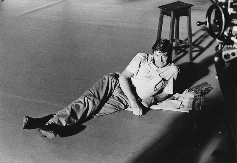 David Mullen lying on a studio floor