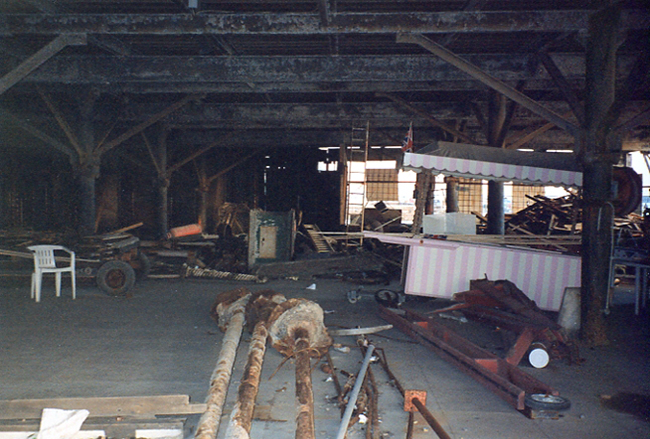 Rubble and old furniture under the pier.