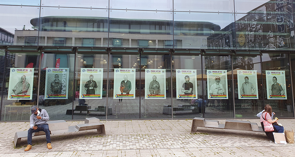 Portraits of Sussex GLF in large windows of Jubilee Library