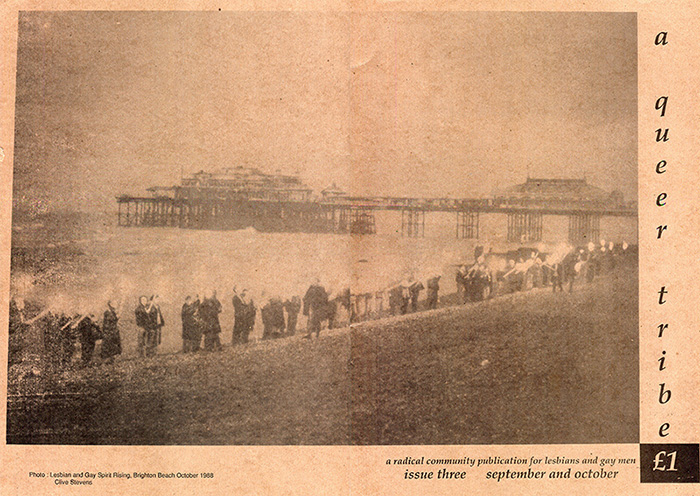 Torch-lit beach demonstration on the front and back cover of A Queer Tribe magazine