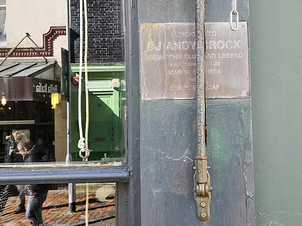 Rectangular metal plaque on a wall