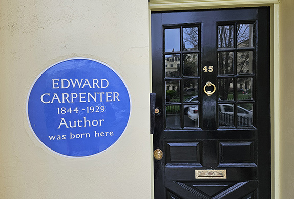 Black front door with a blue plaque: Edward Carpenter 1844–1929 Author was born here