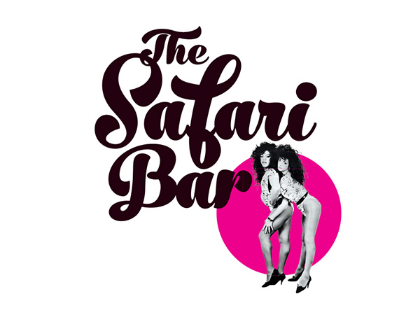 Two drag queens posed together, with the words: The Safari Bar