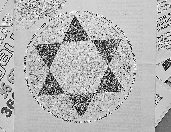 Illustration of six pointed star with twenty words around the outside